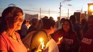 Beth Harris, Elaine Cohen, members of Puente, Kabbalat Shabbat at vigil outside Eloy detention center Friday Oct. 7, photo by Deborah Mayaan