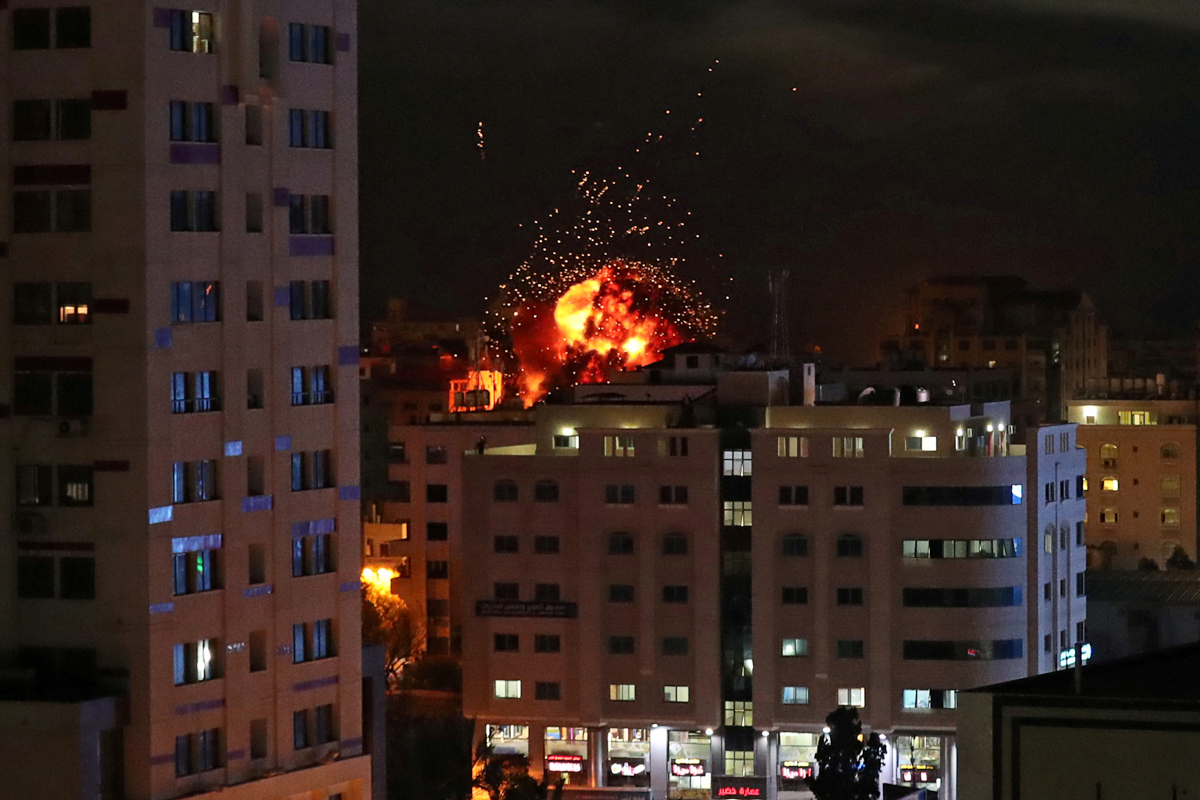 A ball of fire is seen during an Israeli air strike in Gaza City May 4, 2019. REUTERS/Suhaib Salem     TPX IMAGES OF THE DAY - RC1537A1C380