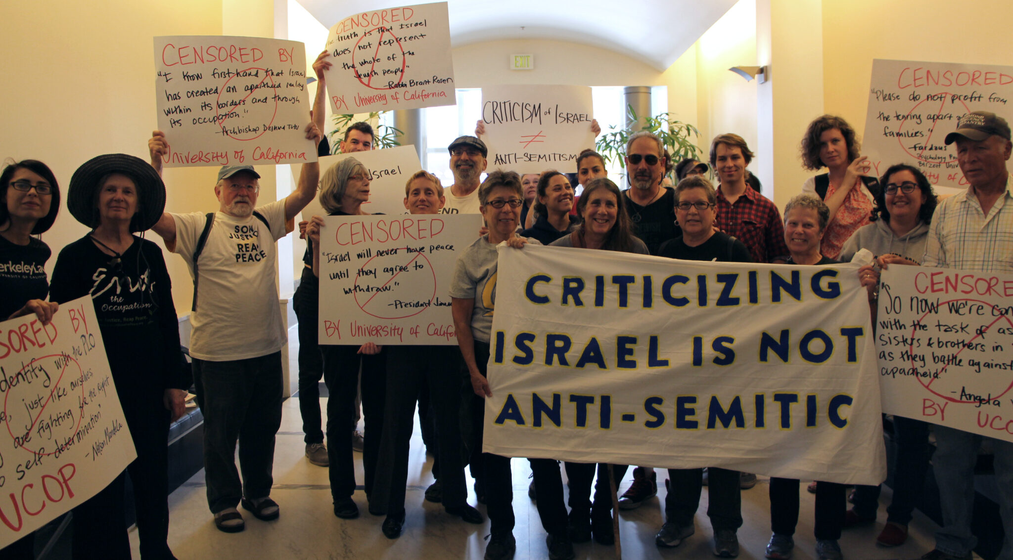 Group-Shot-with-Signs