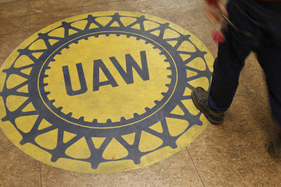 A man arrives at a UAW Hall before listening to Democratic presidential candidate, former Maryland Gov. Martin O'Malley and others seeking political office address members of the Ankeny Area Democrats in Des Moines, Iowa, Thursday, Jan. 14, 2016. (AP Photo/Patrick Semansky)