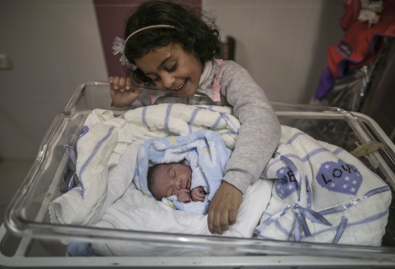 (180211) -- GAZA, Feb. 11, 2018 (Xinhua) -- A Palestinian newborn baby is seen inside a hospital in Gaza City, on Feb. 11, 2018. The test-tube baby, named Mujahid, has been born with the smuggled sperm of his father who has been sentenced for seven years in Israeli jail. Many Palestinian women with husbands serving long terms in Israeli jails have resorted to sneaking sperm out and getting pregnant. (Xinhua/Wissam Nassar) - Wissam Nassar -//CHINENOUVELLE_chinenouvelle0227/Credit:CHINE NOUVELLE/SIPA/1802120635 (Newscom TagID: sfphotosthree244078.jpg) [Photo via Newscom]