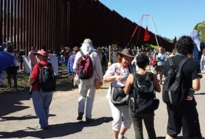 The march arrives at the wall - US side photo by Deborah Mayaan 