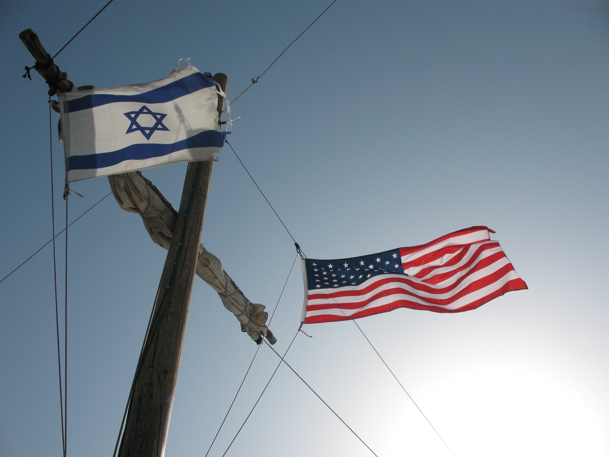 <a href="https://commons.wikimedia.org/wiki/File:American_and_Israeli_Flags_on_Mast_0844.jpg">American and Israeli Flags on Mast 0844</a> by James Emery, used under Creative Commons Attribution 2.0 Generic.