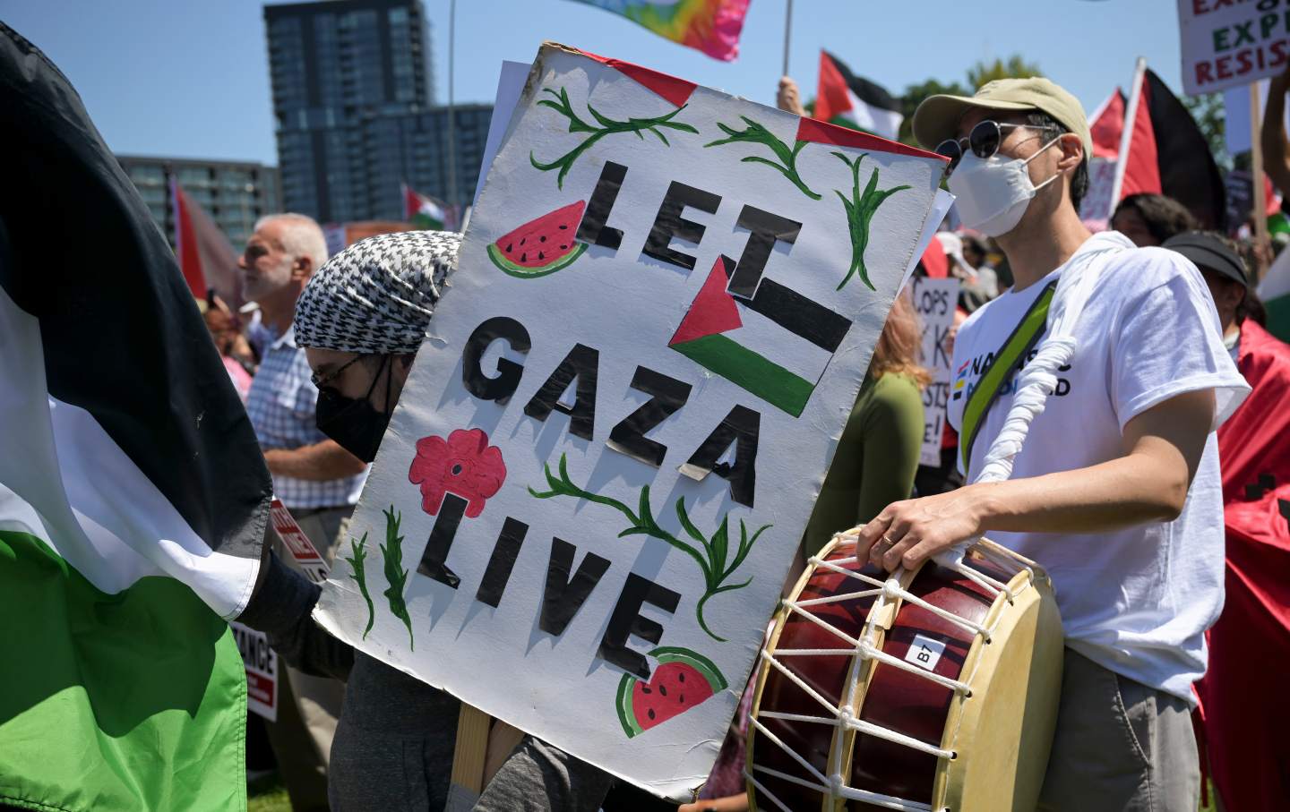 A demonstrator carries a sign ahead of the Democratic National Convention (DNC) near the United Center in Chicago, Illinois, on August 19, 2024.

( Victor J. Blue / Bloomberg via Getty Images)