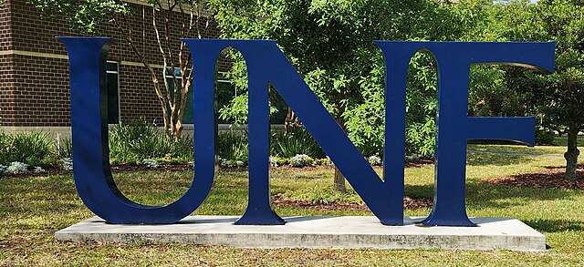 <a href="https://commons.wikimedia.org/wiki/File:University_of_North_Florida_Logo_on_Campus.jpg">University of North Florida Logo on Campus</a> by UNF Botanical Garden, used under Creative Commons Attribution 1.0.