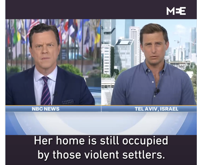 Two men look toward the screen during a news interview.